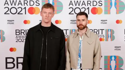 Getty Images Matt McBriar and Andrew Ferguson standing at the 2021 Brit Awards