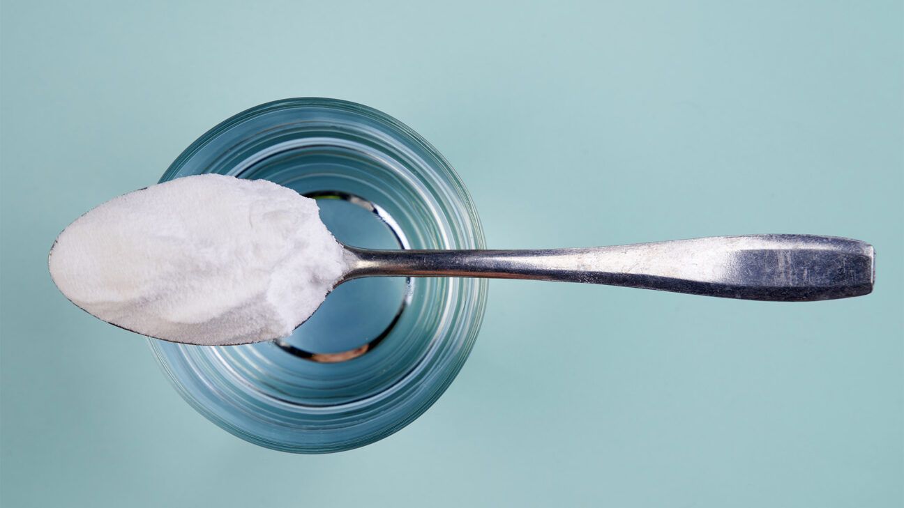 A spoonful of baking soda and a glass of water.