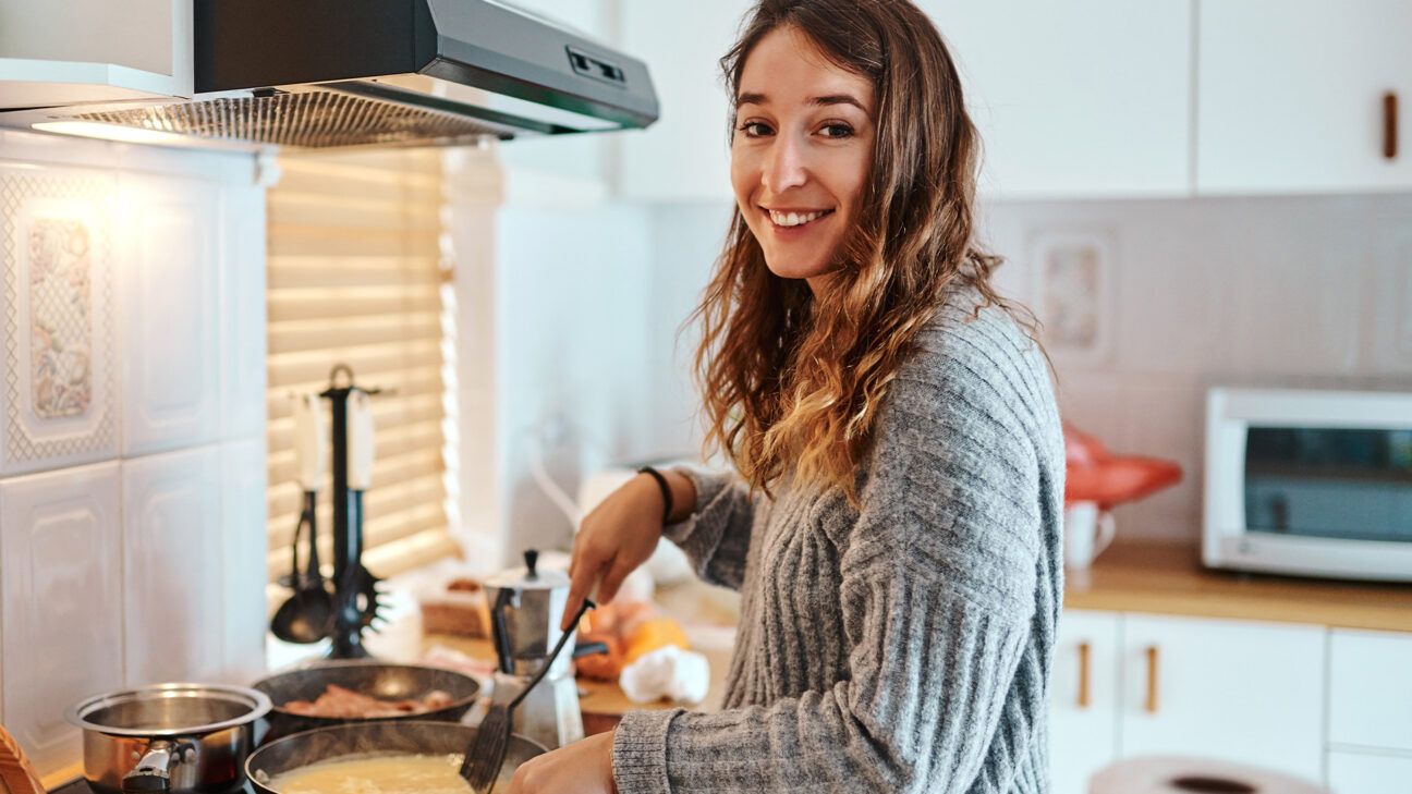 A female cooking food.