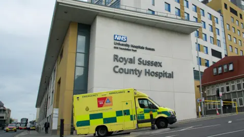 BBC / Mark Norman An ambulance driving past one of the entrances to the Royal Sussex County Hospital in Brighton, East Sussex.