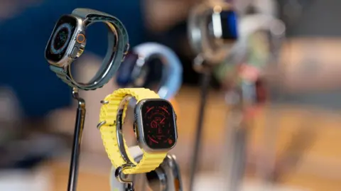 Getty Images Apple Watches on display at a store