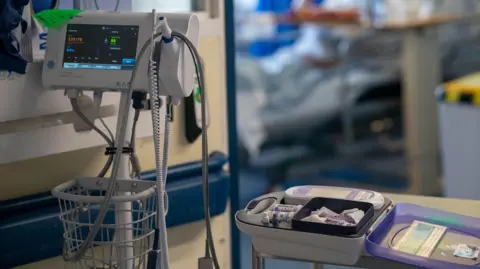 PA General view of medical equipment in front of a hospital bed on a NHS ward