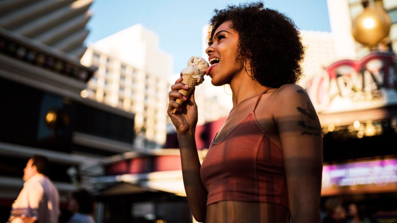 A female eating ice cream.