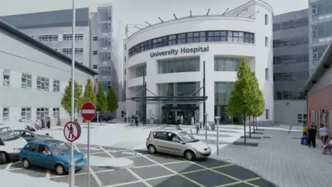 Google An exterior shot of University Hospital Coventry. Above the white round entrance building a sign reads 