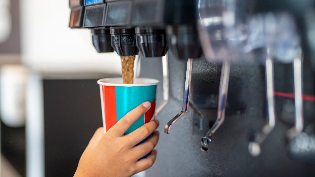 Filling up a cup of soda