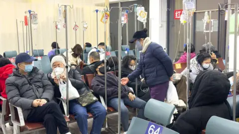 Getty Images Patients receive infusion therapy at a hospital amid a spike in respiratory illnesses on December 27, 2024 in Shanghai