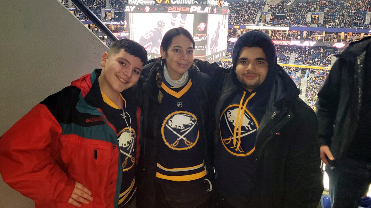 Stroke and heart attack survivor Joanne Matos with her two sons