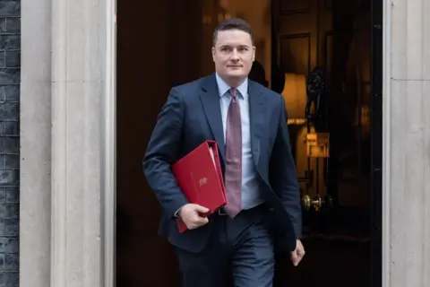 Wiktor Szymanowicz/Anadolu via Getty Images Secretary of State for Health and Social Care Wes Streeting leaves 10 Downing Street after attending the weekly Cabinet meeting in London, United Kingdom on March 04, 2025