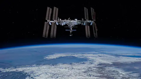 Getty Images The International Space Stations orbiting above the Earth