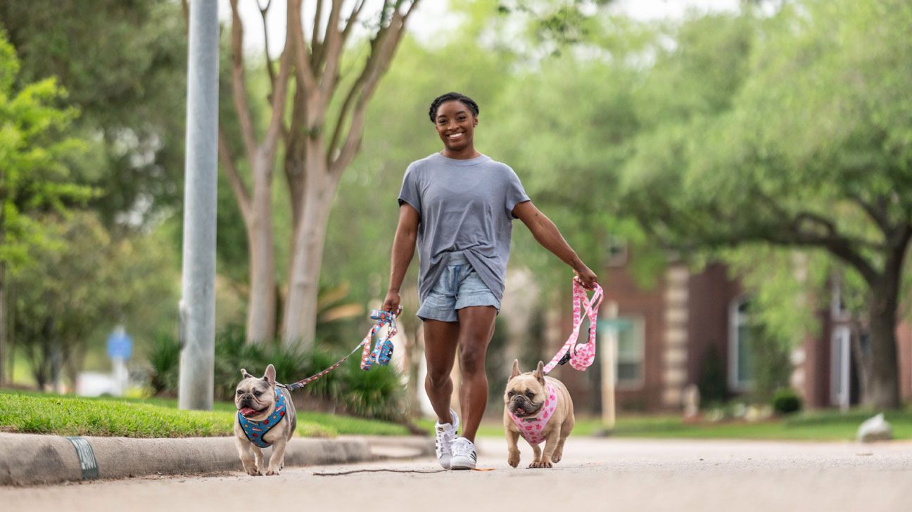 Olympic gymnast Simone Biles and her dogs Lilo and Rambo