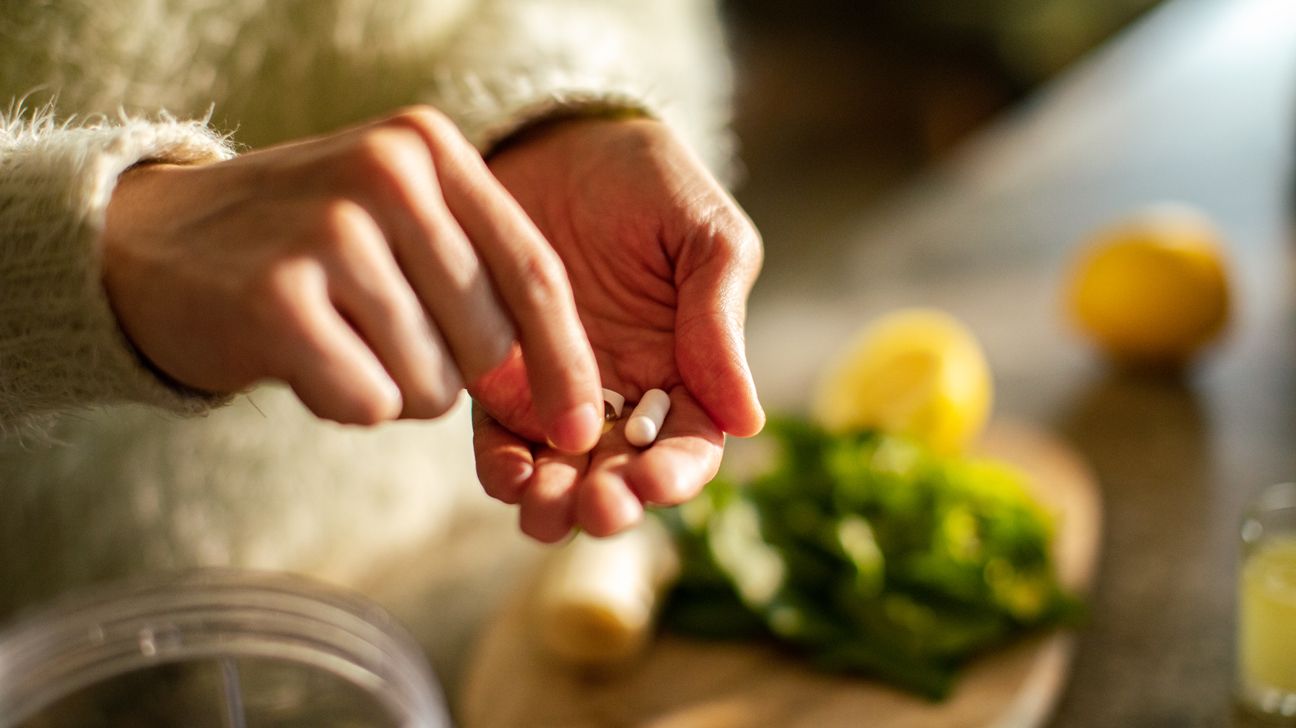 Probiotic supplements in hands