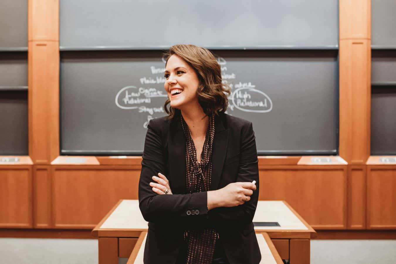 Alison Wood Brooks in a lecture hall at Harvard Business School