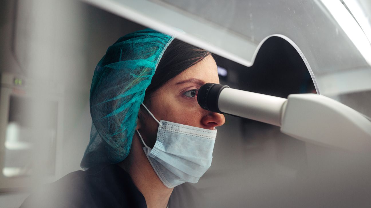 Scientist in genetics lab HIV vaccine research