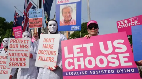 PA Campaigners holding placards who support and oppose the assisted dying bill demonstrate at Parliament Square in Westminster ahead of the debate in the House of Commons