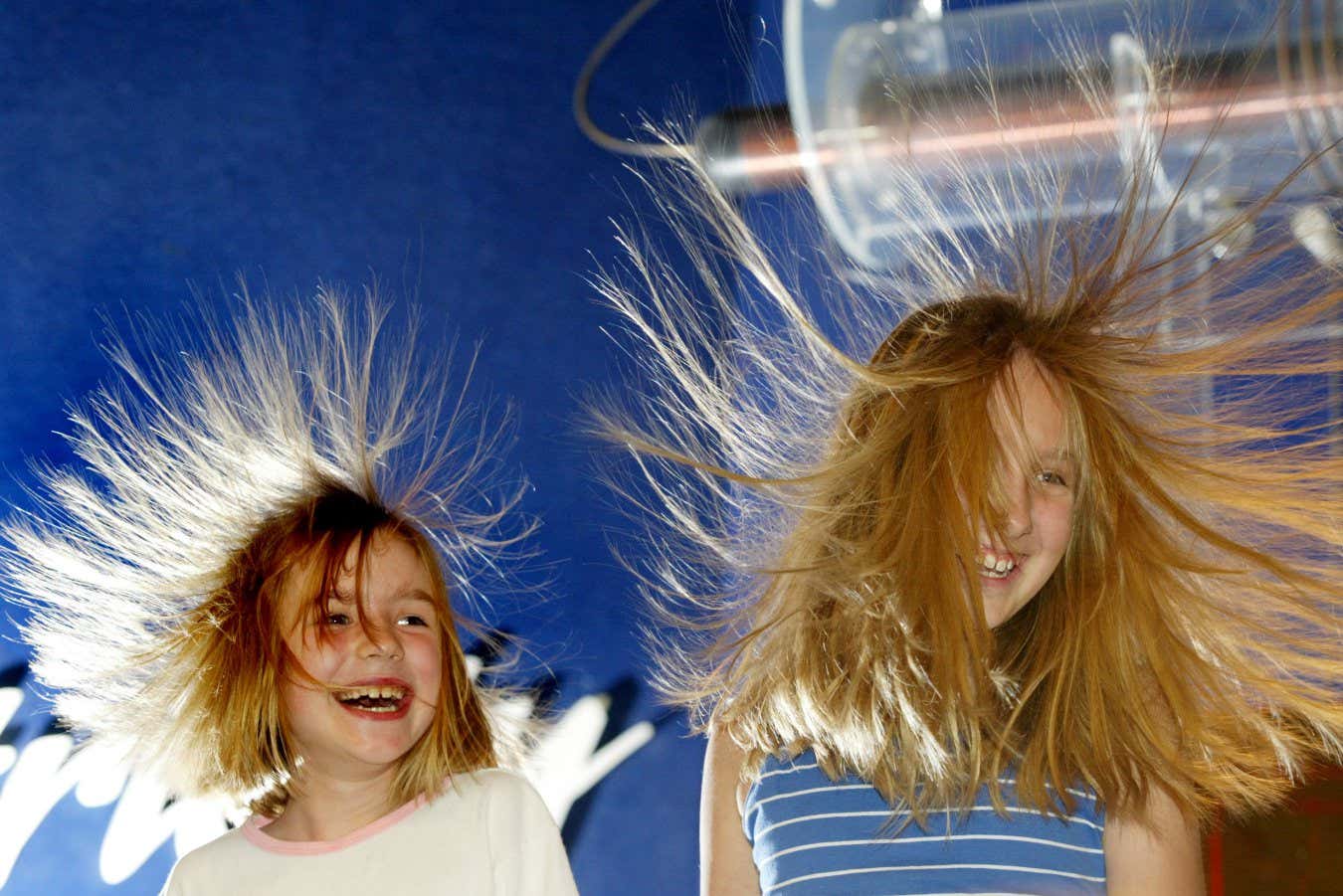 Science RB01 09/26/04 OntaRIO Science Centre 35th anniversary today and one of its original exhibits is still the most popular is the static electricity display at the Live Electricity show provides laughter for all . Katie Carson and Carmilla Dorozynski display their locks.Ron Bull Toronto Star (Photo by Ron Bull/Toronto Star via Getty Images)