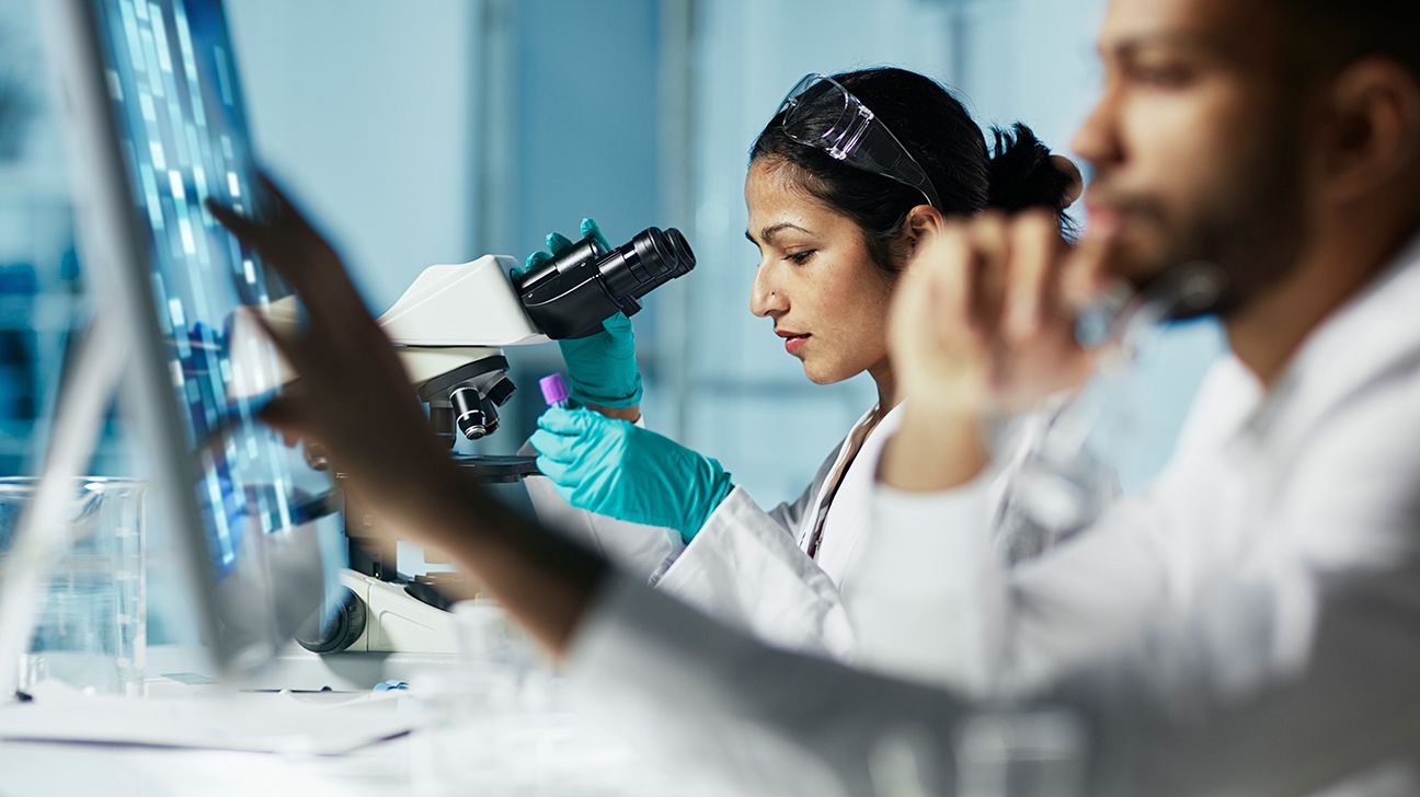 Scientists researching in laboratory