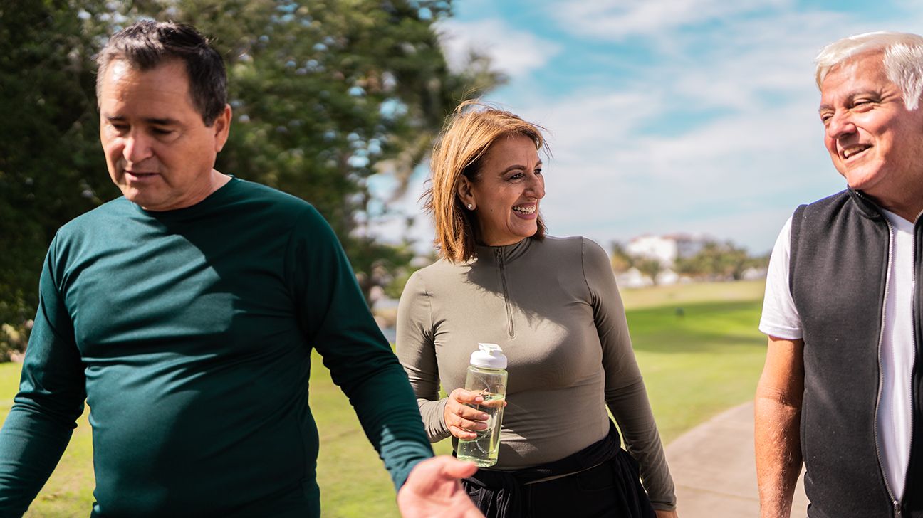 Older adults walking together outdoors