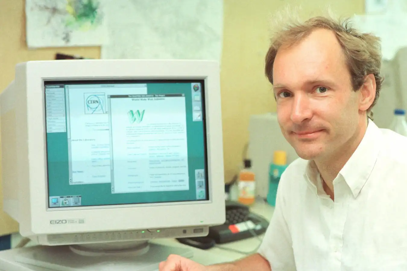 Berners-Lee with an early form of the websites that he invented at CERN, in 1994