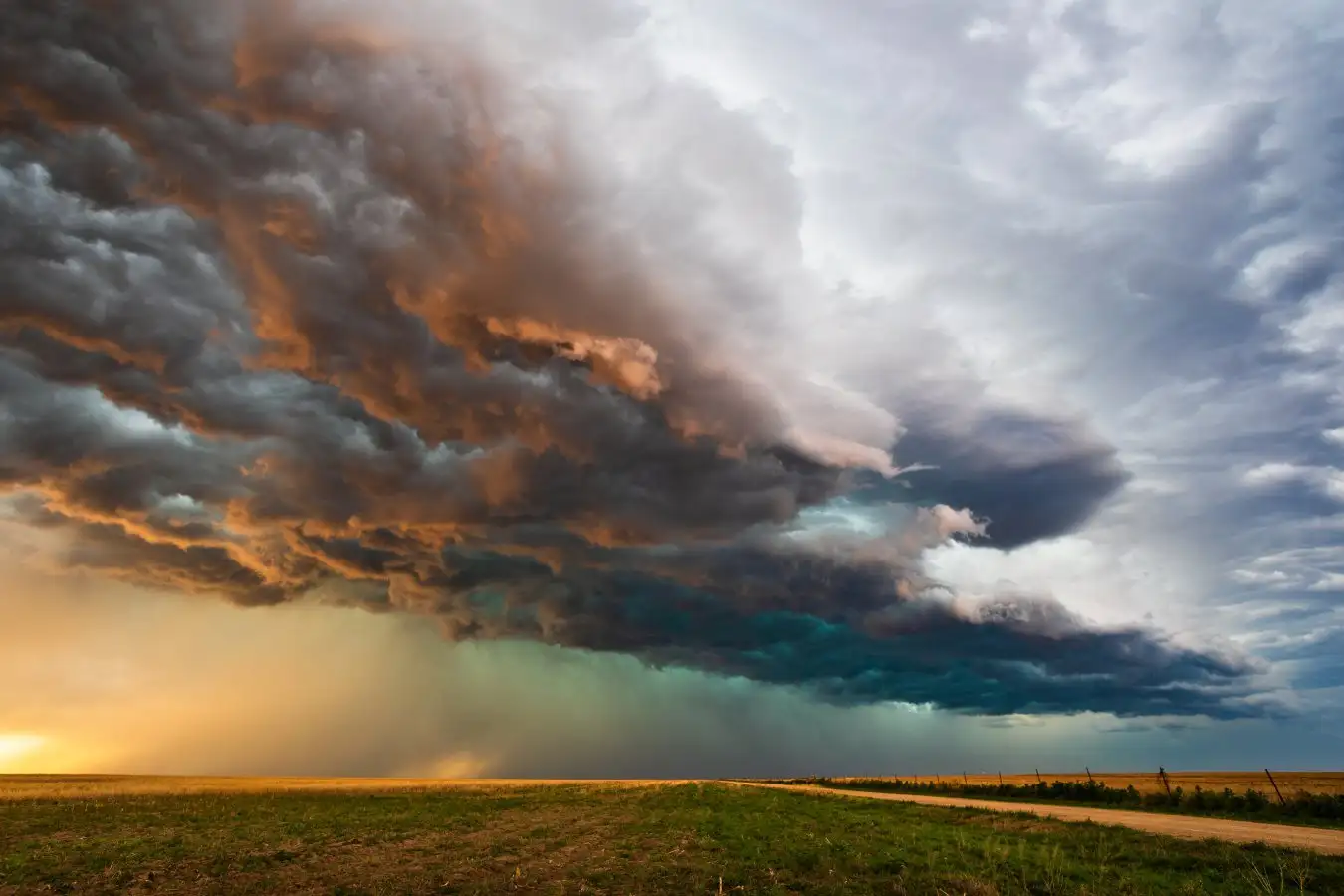 Stormy sky with dramatic clouds from an approaching thunderstorm at sunset; Shutterstock ID 1694358319; purchase_order: -; job: -; client: -; other: