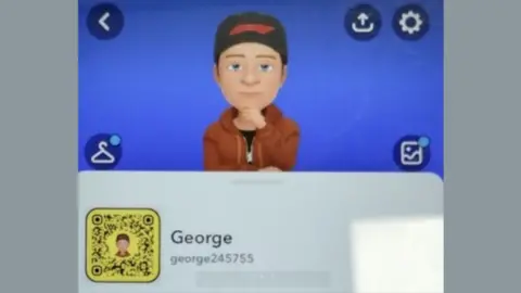 Snapchat Lipscombe used the name of George when he chatted to Olivia. His Snapchat emoji character appears to be a young man with a black hat. He is wearing a brown hoody with a black T-shirt underneath. He has his hand on his chin.