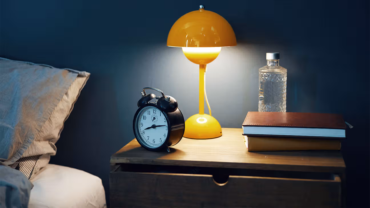 Alarm clock on night stand