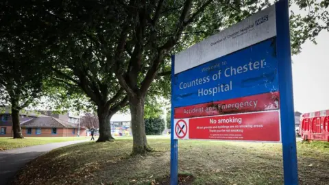 EPA A sign at the entrance to the Countess of Chester Hospital says 'Welcome to Countess of Chester Hospital, accident and emergency and Countess of Chester NHS Foundation Trust'.