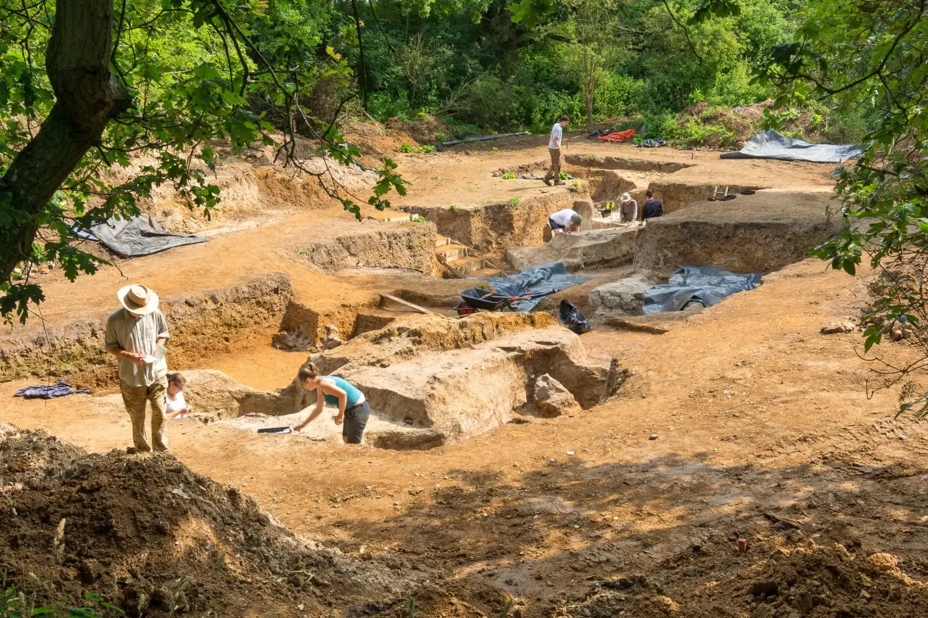 Deliberate fire-making by humans in the UK may date to more than 400,000 years ago, according to evidence described in Nature this week. The discovery of baked sediments, heat-shattered flint axes and pieces of pyrite ? a stone used to create sparks for lighting tinder ? in a disused claypit in the east of England suggests that humans at this site were able to make and maintain fires. The findings predate previous evidence for the deliberate lighting of fires by around 350,000 years and indicate a shift in human behaviour that may have contributed to an increase in brain size and cognitive abilities. Excavation of 400,000 year old pond sediments at Barnham, Suffolk