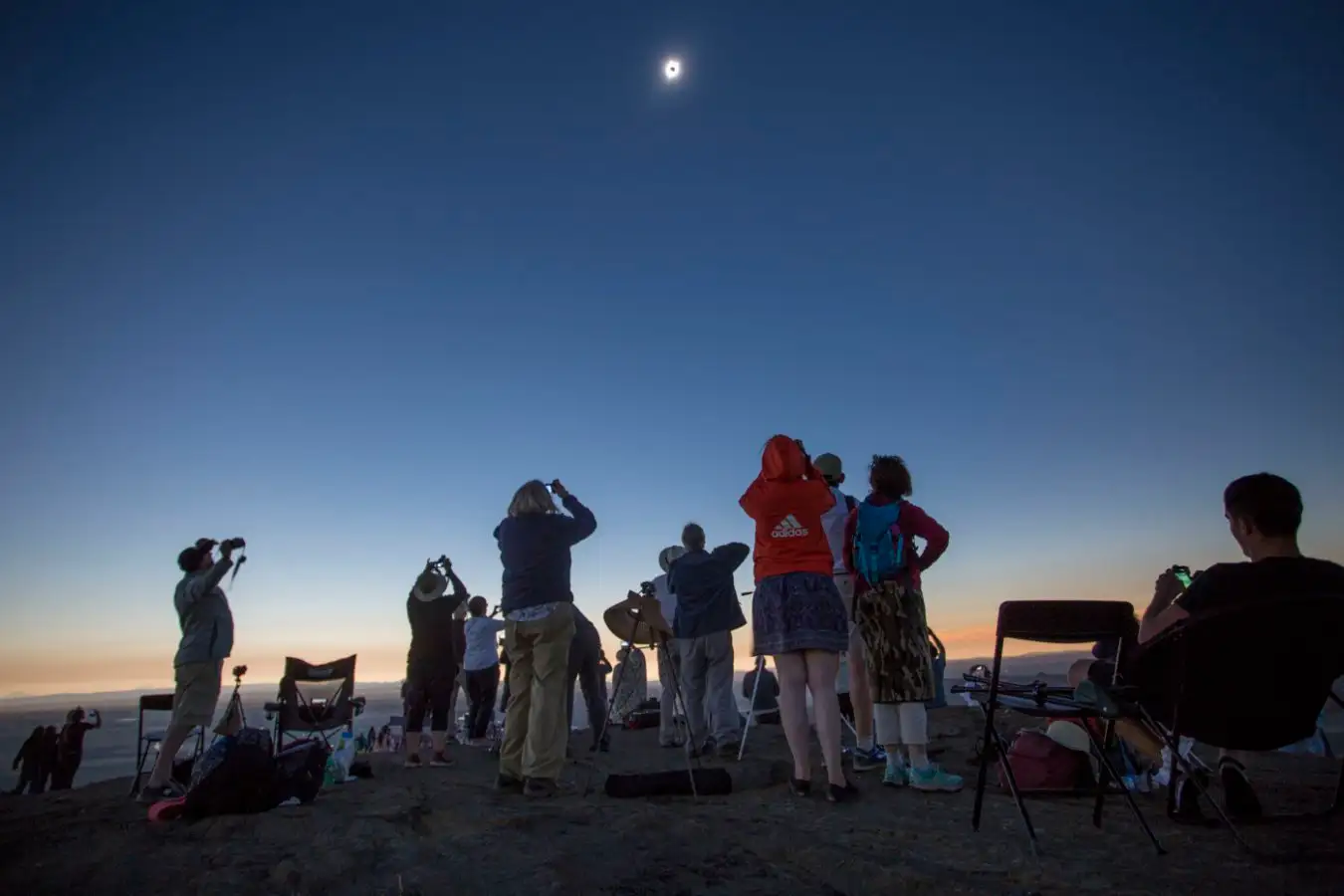 MENAN, ID - AUGUST 21: Locals and travelers from around the world gather on Menan Butte to watch the eclipse on August 21, 2017 in Menan, Idaho. Millions of people have flocked to areas of the U.S. that are in the