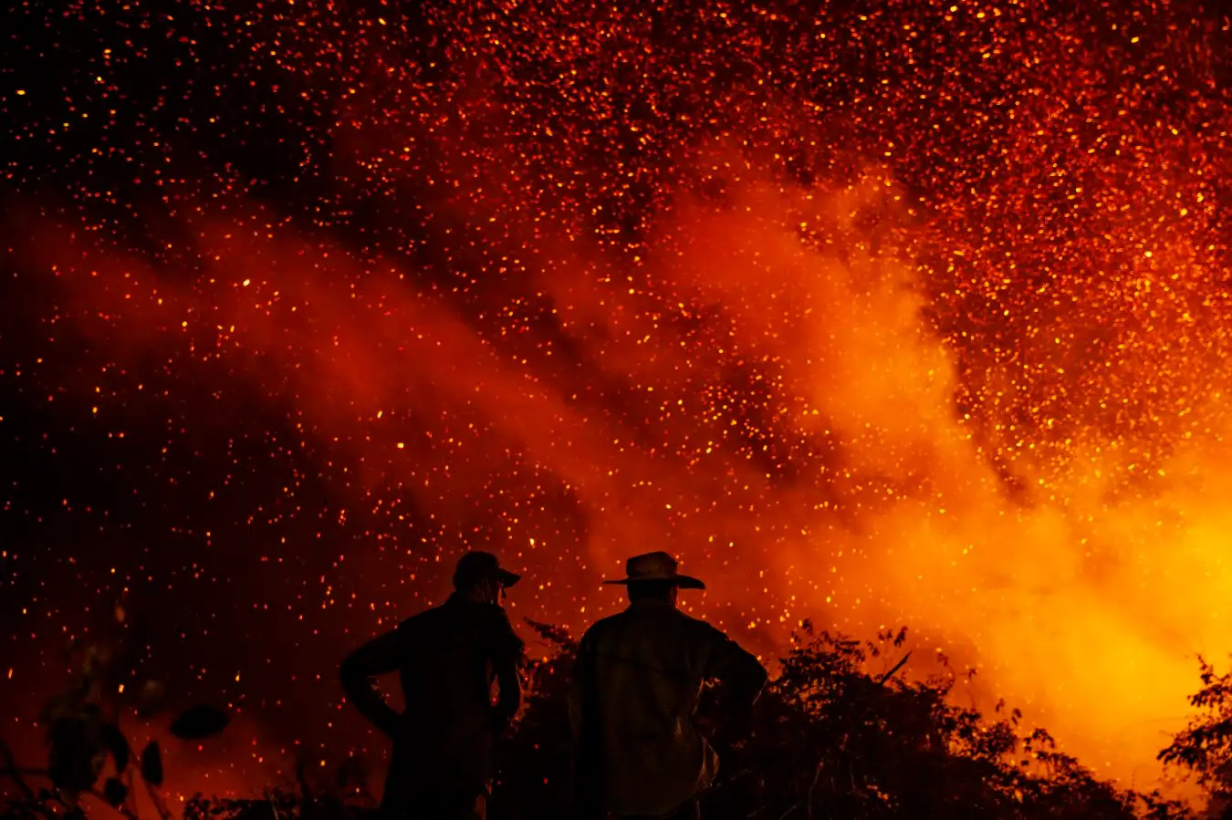 Volunteer firefighters assess the wildfire on Jofre Velho ranch, Porto Jofre, Mato Grosso, 2020 ? Lalo de Almeida