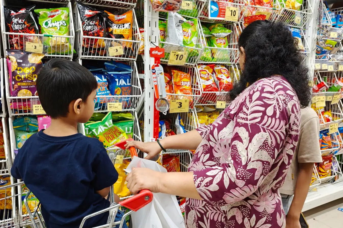 Packets of chips are on display at a supermarket in Mumbai, India, on September 7, 2025.