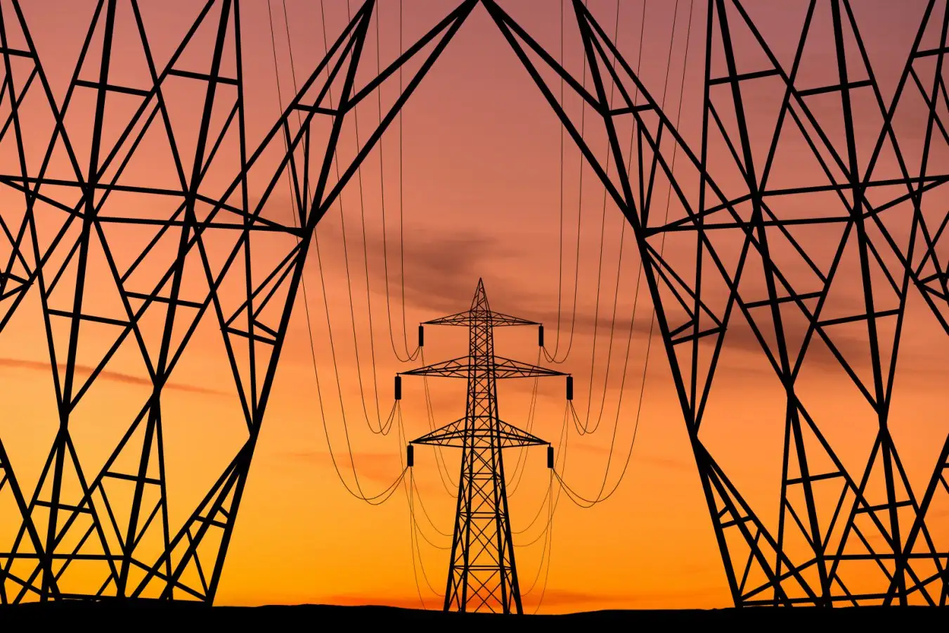 Electrical pylons at sunset