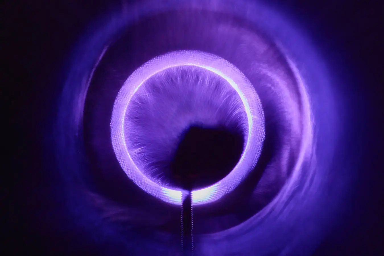Real image of the plasma electrode interaction around a solid cathode in front of a sample of Astral's lattice confinement fusion (LCF) material.