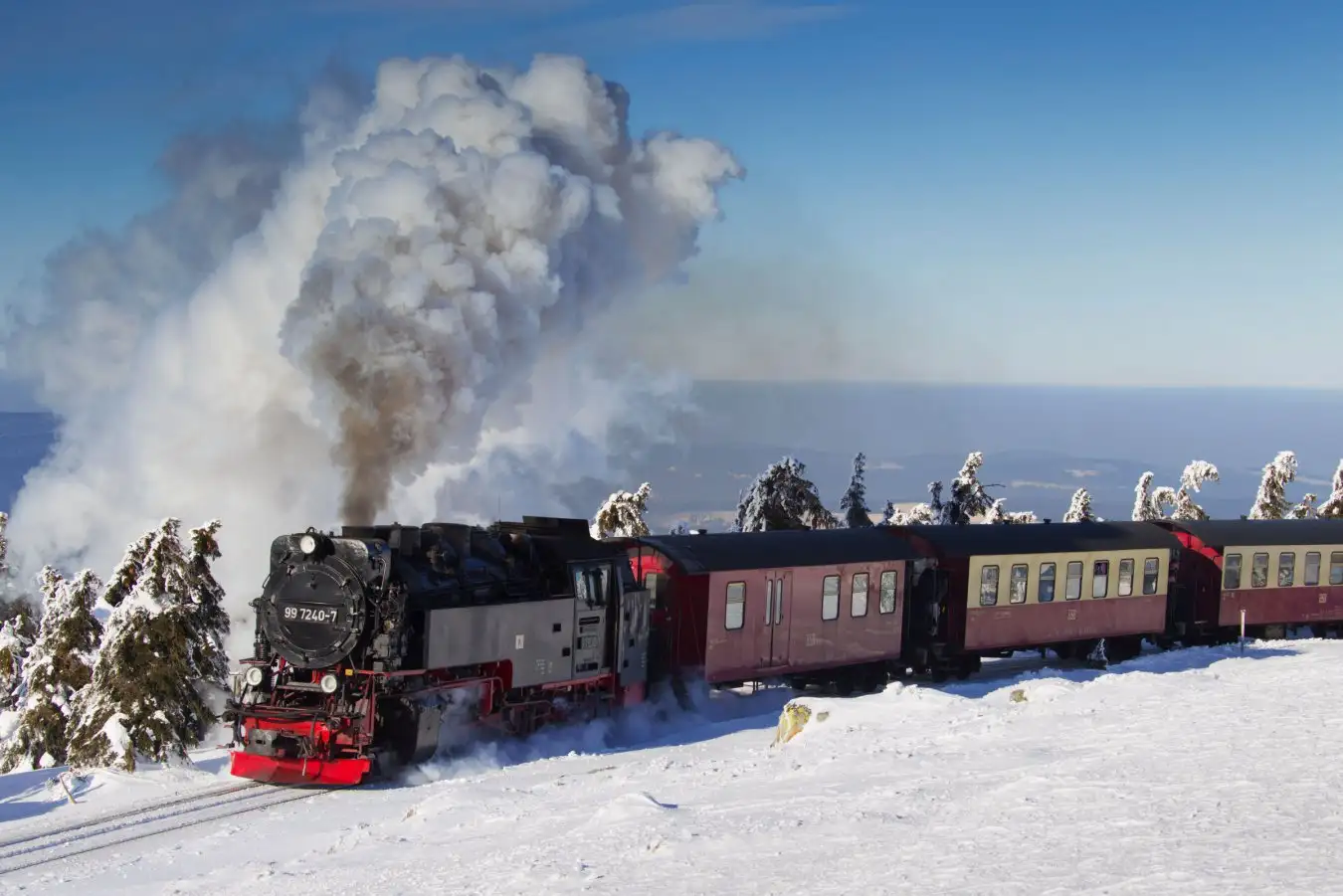 Steam train in the snow in winter at the Harz National Park, Saxony-Anhalt, Germany
