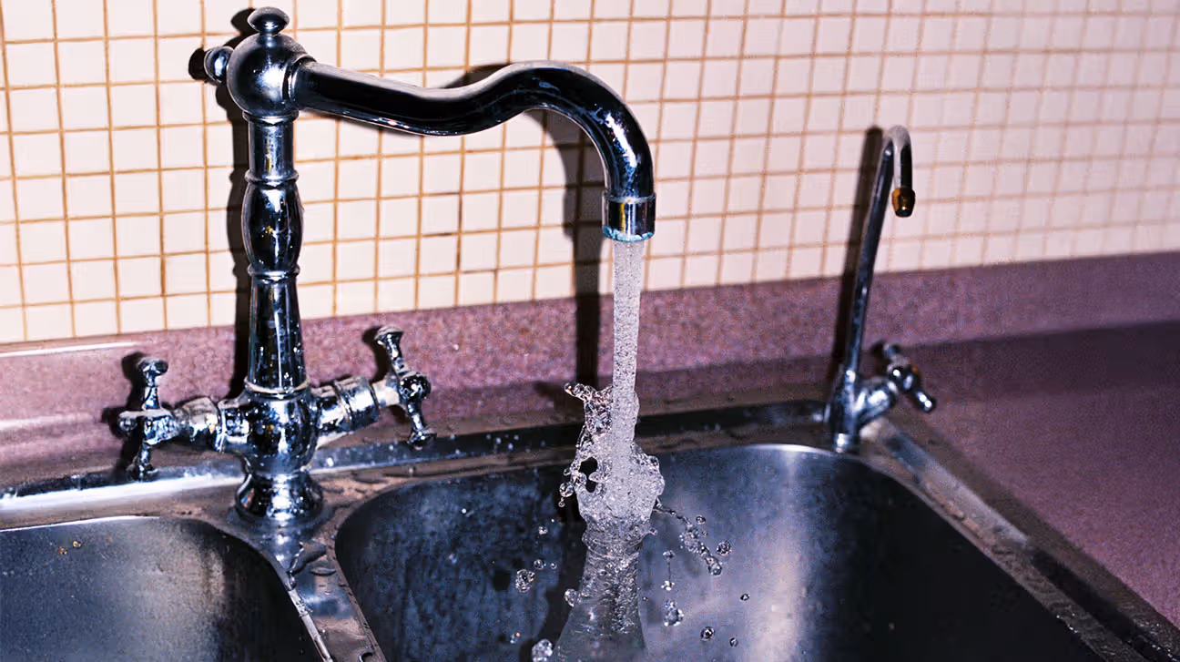 Drinking water flows from kitchen sink tap
