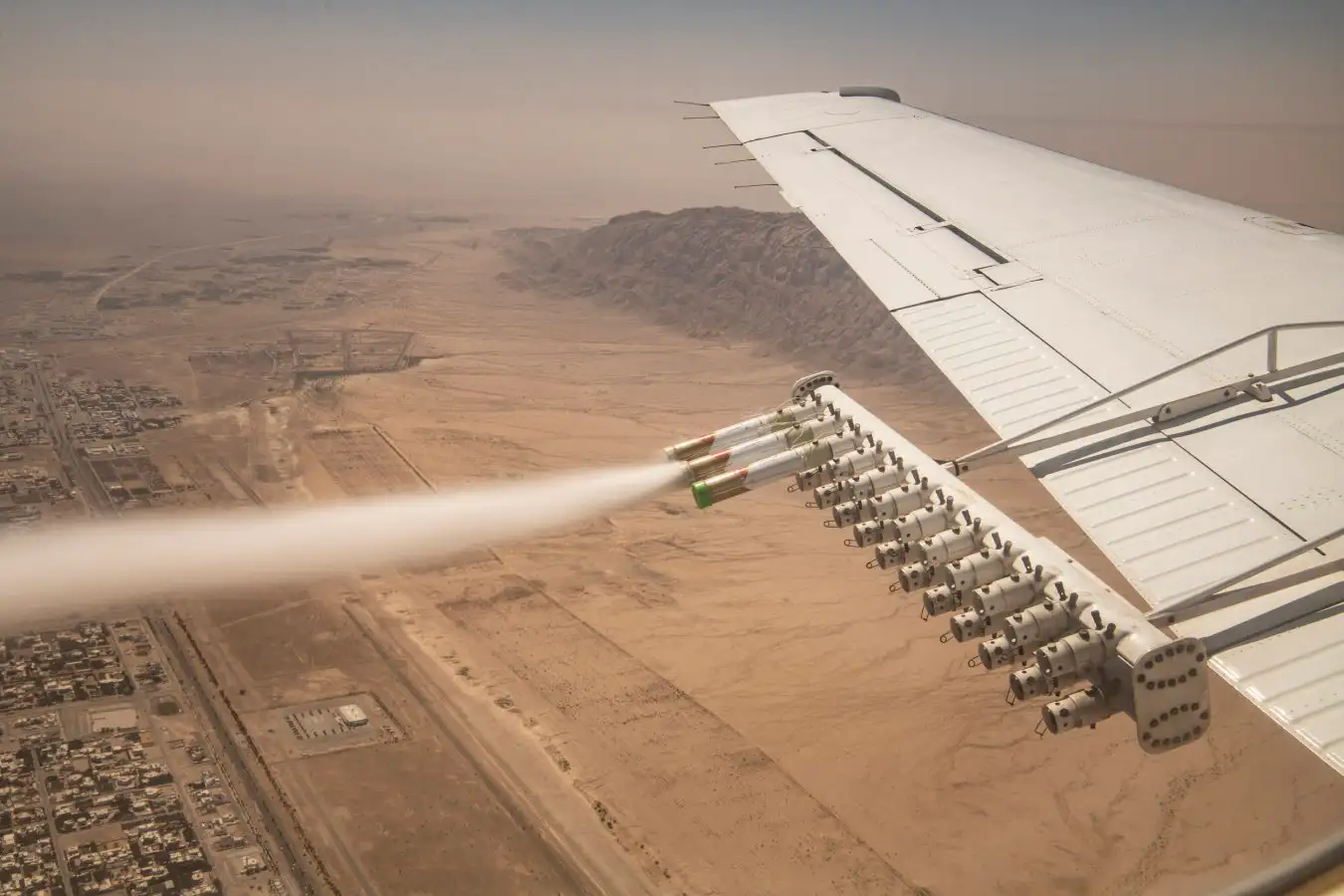 FILE -- Nanomaterial is released for the National Center of Meteorology and Seismology during a demonstration cloud seeding flight over in Al Ain, United Arab Emirates, March 3, 2022. India's experimental efforts in October 2025 to seed clouds and produce rain to help wash away pollution over New Dehli were unsuccessful. (Bryan Denton/The New York Times) / Redux / eyevine Please agree fees before use. SPECIAL RATES MAY APPLY. For further information please contact eyevine tel: +44 (0) 20 8709 8709 e-mail: info@eyevine.com www.eyevine.com