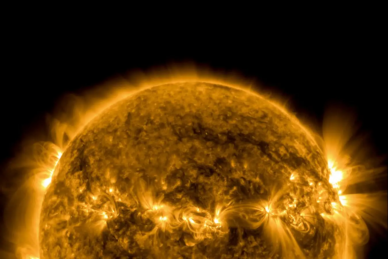 Interacting Active Regions A series of active regions, lined up one after the other across the upper half of the Sun, twisted and interacted with each other over 4.5 days (Sept. 28 - Oct. 2, 2011). As seen in extreme UV light, the magnetically intense active regions sported coils of arcing loops and numerous times these magnetic field lines above them can be seen connecting with the active region next door. Towards the end of the clip, a leading active region blasted out a coronal mass ejection, quickly succeeded by a blast from another active region. The disruption of the magnetic field from one likely triggered the second, a phenomenon that we have observed before by SDO.