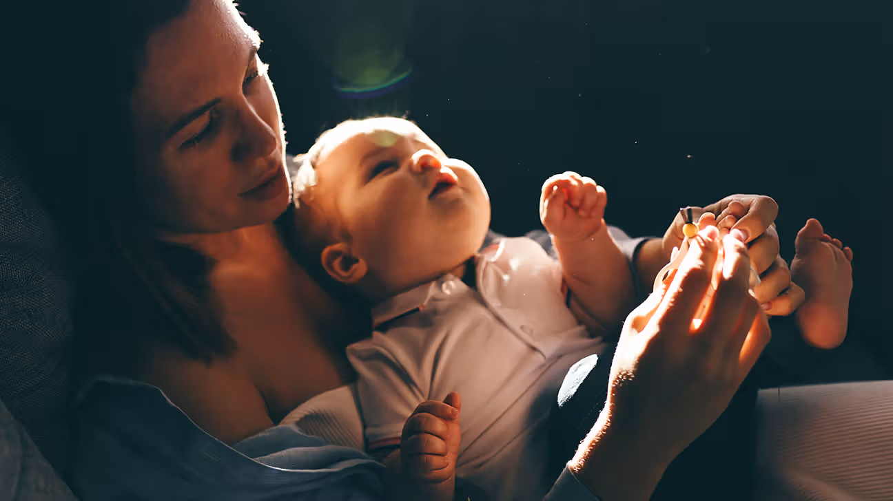 New mother holds an infant