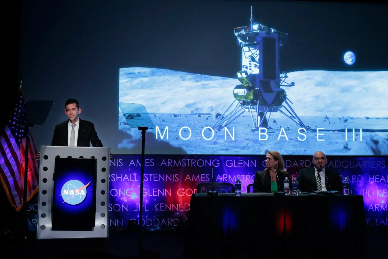 NASA administrator Jared Isaacman (left) announcing its plans to establish a permanent presence on the moon during a press conference at the agency's headquarters in Washington, DC, on 26 May