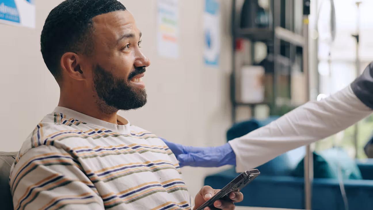 Male patient talks with doctor about colorectal cancer screening