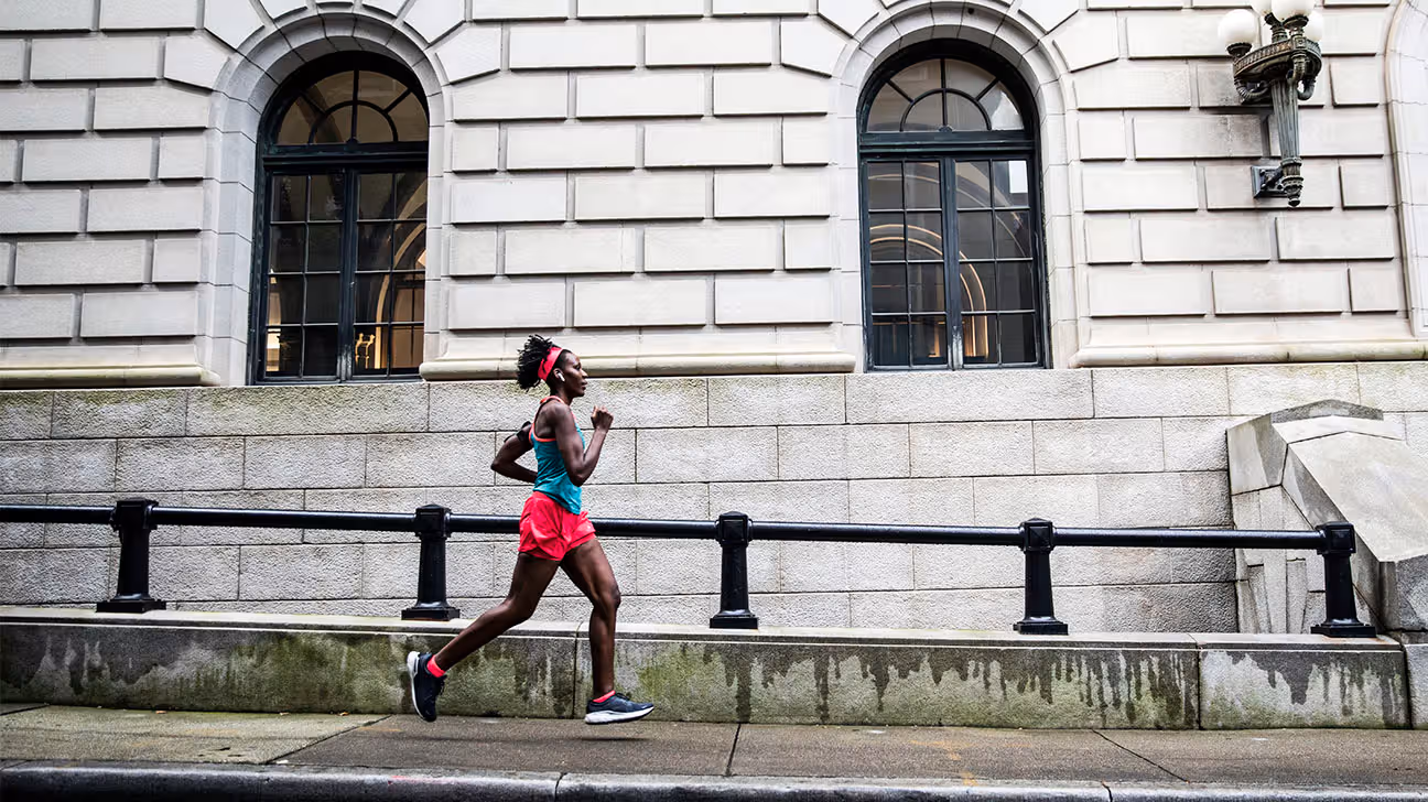 Female running on city street