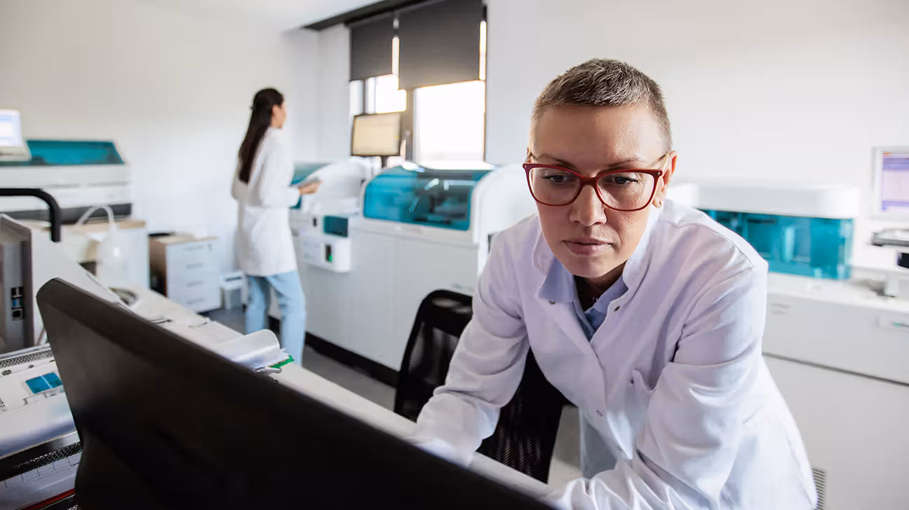 A healthcare professional using a computer.