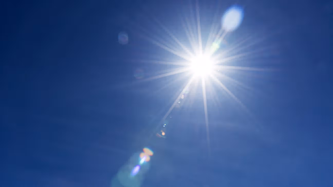 Sunshine against a blue sky