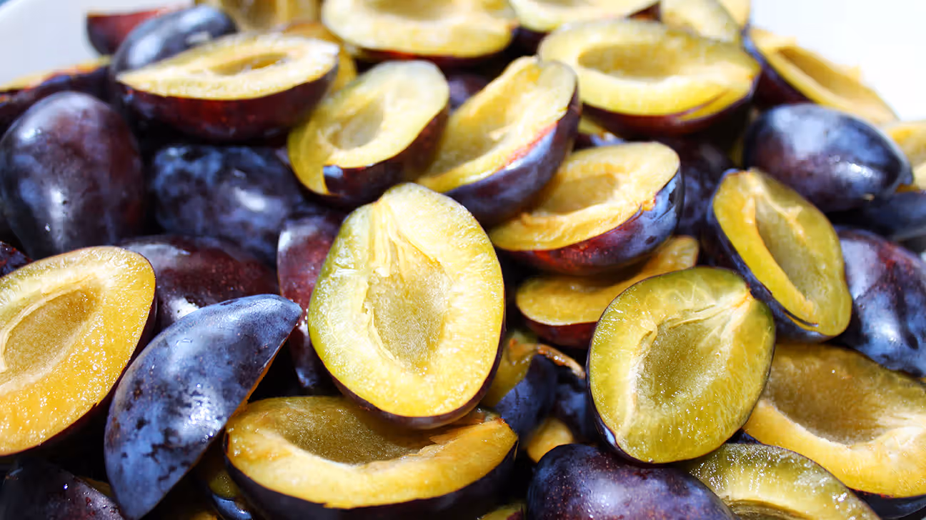 Close up image of sliced plums