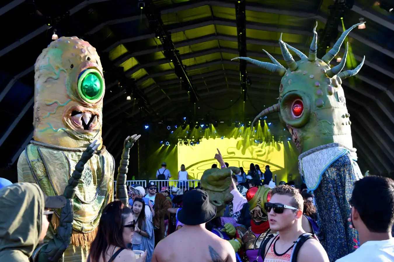 Festivalgoers dressed as aliens