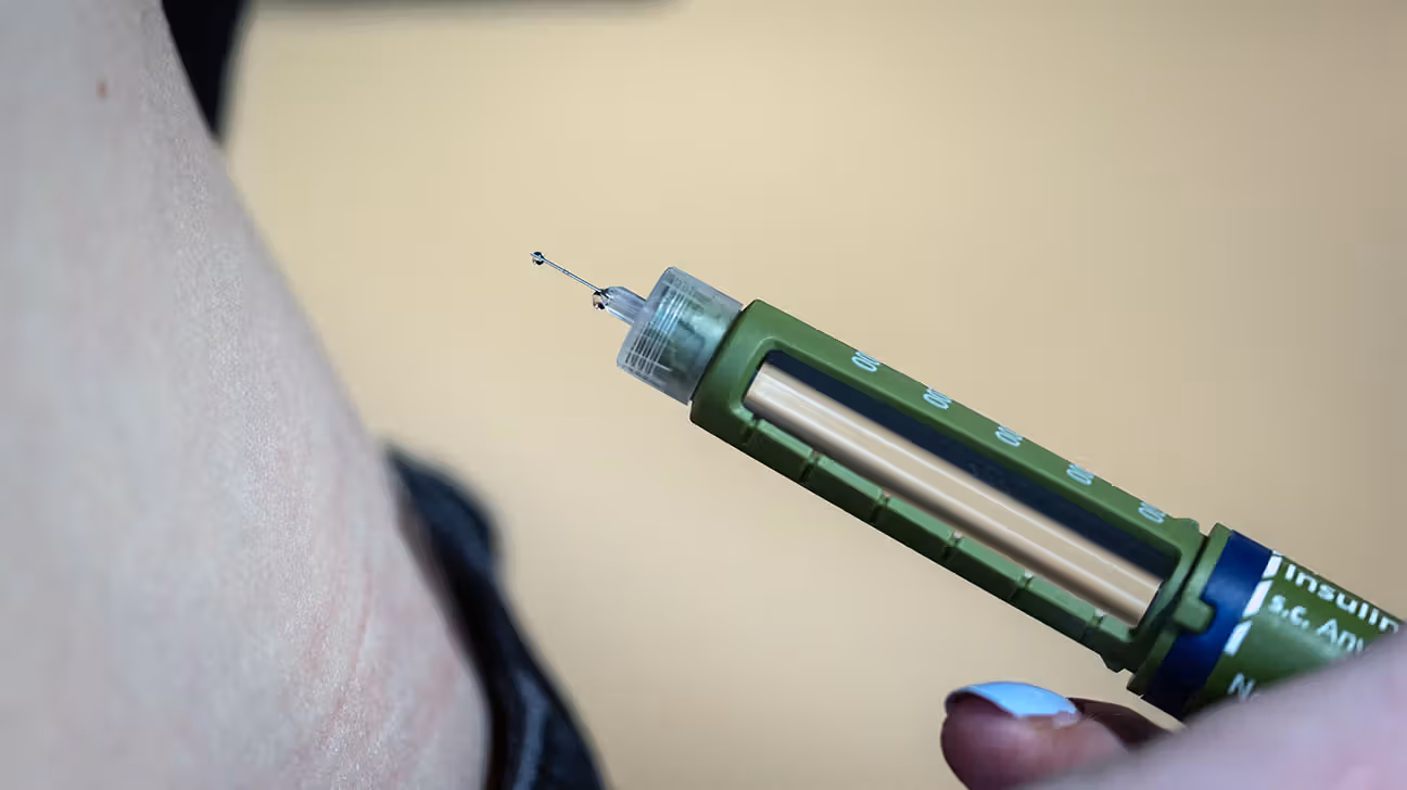 Close-up of a GLP-1 injection pen